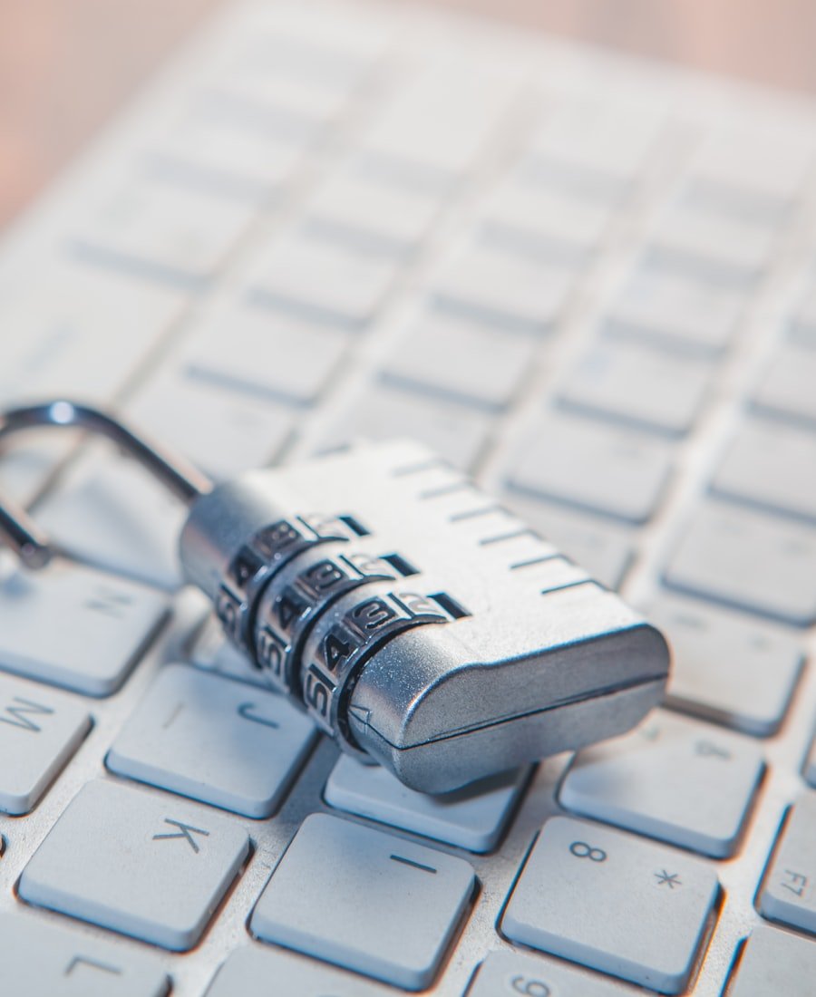 Combination padlock resting on a keyboard, representing cryptographic key management